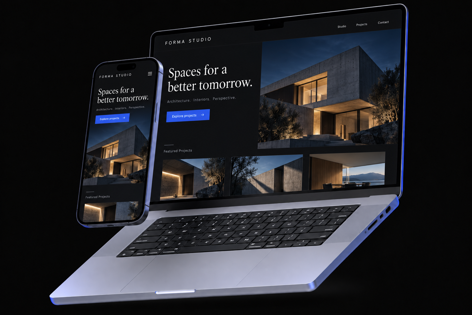Laptop i telefon z przykładową ciemną stroną studia architektury